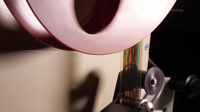 The fascination of cinema - 35mm film projected in a movie theater