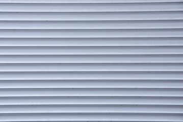 gray plastic texture of gray dirty rolls on the window