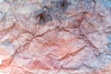 Crumpled watercolor paper, multicolored paper. Deformed surface. Abstract design background