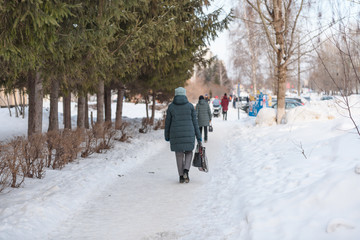 Urban winter landscape of Russia. City under the snow. Winter on the streets. City in Siberia.