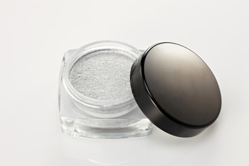 pearl shadow cosmetics in containers.