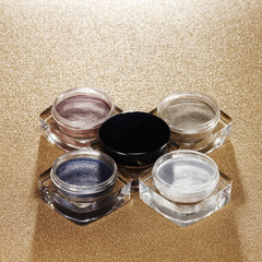Conceptual Image of Pearl Shadow Cosmetics Set.