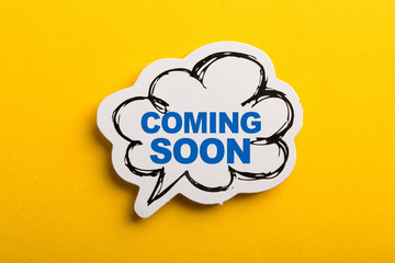 Coming Soon Speech Bubble Isolated On Yellow Background