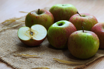 fresh apple on burlap background