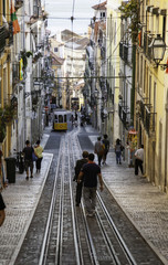 Obraz premium Ancient and Old Lisbon tram, detail of an ancient means of transportation around the city, monument of Lisbon