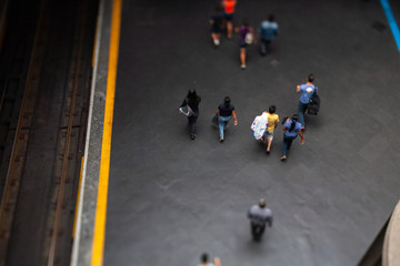 Obraz premium Mockup model style urban landscape - people on subway train platform - real tilt-shift TS lens