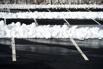 empty parking lot with snow removed