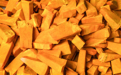 Yellow pumpkin slice small for cook food on background