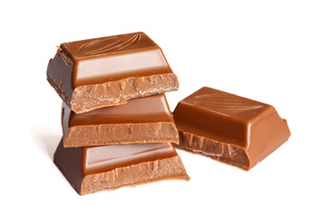 Tasty milk brown chocolate close-up isolated on white background