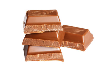 Tasty milk brown chocolate close-up isolated on white background