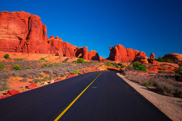 Endles road, Road through the mountains. USA. COLORADO. ARCHES NATIONAL PARK.