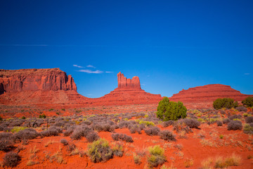 Fototapeta premium Monument Valley. Navajo Tribal Park. Red rocks and mountains. Located on the Arizona–Utah border. USA