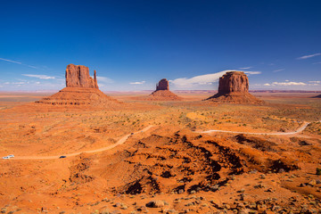 Monument Valley. Navajo Tribal Park. Red rocks and mountains. Located on the Arizona–Utah border....