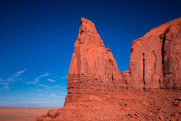 Fototapeta premium Monument Valley. Navajo Tribal Park. Red rocks and mountains. Located on the Arizona–Utah border. USA