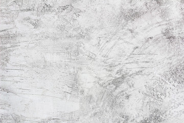 white and gray textured plaster on the wall