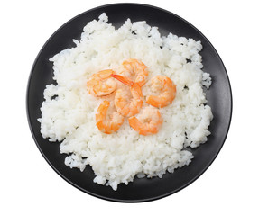 White rice with shrimps in black bowl isolated on white background. top view