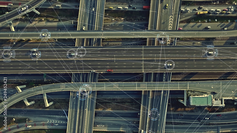 Poster Aerial view from above of traffic on the elevated expressway with futuristic autonomous, driverless cars using artificial intelligence computer network and satellite gps for navigation