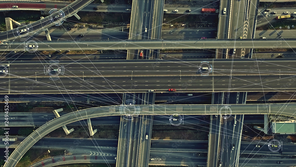 Poster Aerial view from above of traffic on the elevated expressway with futuristic autonomous, driverless cars using artificial intelligence computer network and satellite gps for navigation