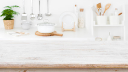Fototapeta na wymiar Rustic wooden table top on blurred kitchen shelf background
