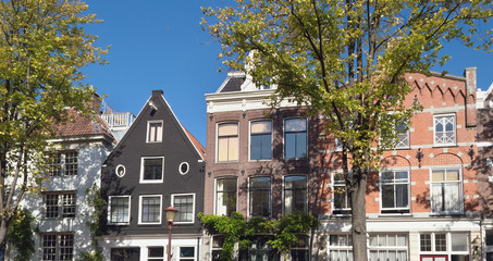 Fototapeta na wymiar exterior of Amsterdam houses on sunny day