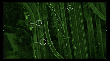 Futuristic HUD satellite car surveillance and identification counter terrorist monitoring highway...