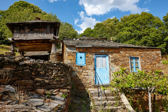 Traditional stone construction village with horreo storage in Asturias
