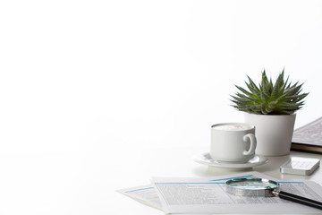 A cup of coffee on the table at the office. Concept for web. Free space.