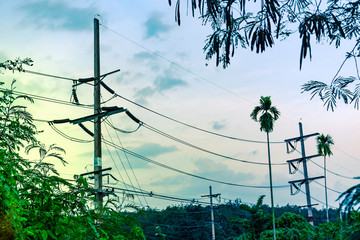Electricity pole with silhouette sunset sky, Electricity pylon with shadow of tree in dawn time,...