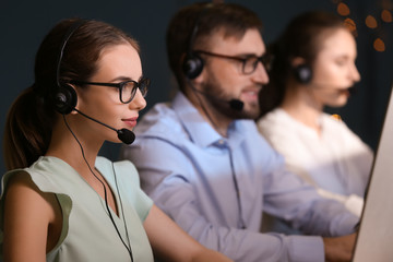 Technical support agents working in office