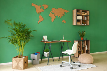 Stylish interior of room with green wall