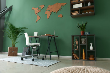 Stylish interior of room with green wall