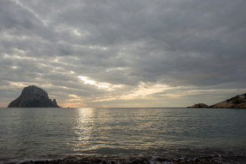 Fototapeta na wymiar Sunset on the island of Es vedra in Ibiza