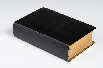 Black Book on White Background