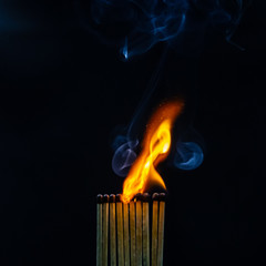 Match, smoke and flame