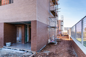 Modern architecture brick houses under construction in Spain