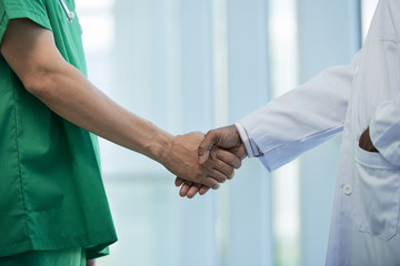 Handshake of doctors