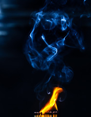 Match, smoke and flame