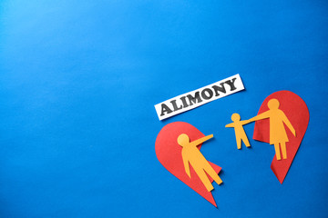 Word ALIMONY with paper figures of family and broken heart on color background