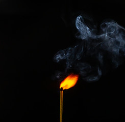 Match, smoke and flame