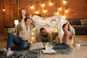 Happy family spending time at home