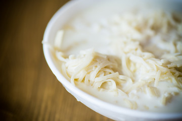 homemade sweet noodles with milk in a plate