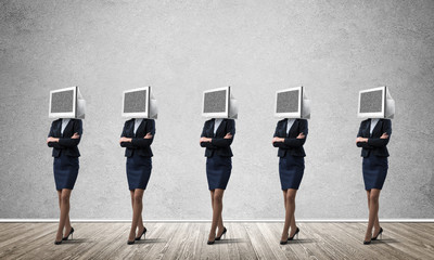 Business women with monitors instead of head.