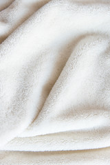 White delicate soft  background of plush fabric