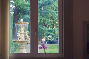 View of the fountain through the window