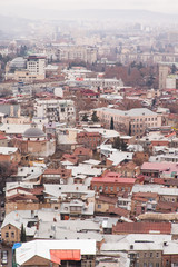 Streets and houses in Tbilisi the day. Old town.  georgia 2019. people, cars, hills, old beautiful buildings located on the hill and near the river