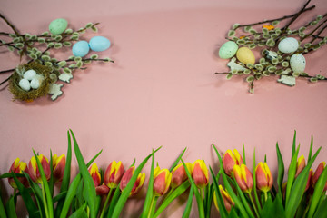 Background for easter, easter nest, catkins, easter eggs, pink background