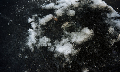 Fisherman pours tea from a thermos in the winter on the ice. Winter fishing