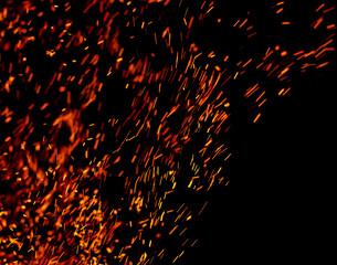 flame of fire with sparks on a black background