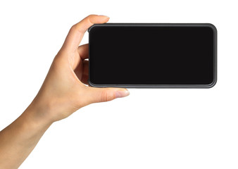 Women's hand showing black smartphone, concept of taking photo or selfie
