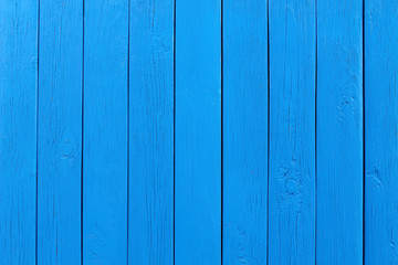 Naklejka premium Old wooden painted boards of blue color. Vertical view. Close-up. Background. Texture.